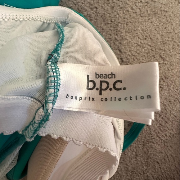 Green one piece swimsuit with attached skirt. Halter strap size XL. - Picture 2 of 3